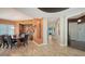 Hallway and dining room, great flow through the house, elegant flooring, and great natural light at 385 N Point Rd # 903, Osprey, FL 34229