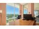 Bright office space with large windows offering panoramic views of the water at 385 N Point Rd # 903, Osprey, FL 34229