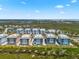 Aerial view of multiple condos in a waterfront community at 388 Aruba Cir # 103, Bradenton, FL 34209