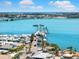 Overhead view of ocean, pier, and beach-side town restaurants and shops at 388 Aruba Cir # 103, Bradenton, FL 34209