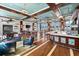 Spacious clubhouse bar, lounge seating, and pool table at 388 Aruba Cir # 103, Bradenton, FL 34209