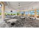 Clubhouse with dining area and bar with beautiful outdoor view at 388 Aruba Cir # 103, Bradenton, FL 34209