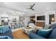 Bright, open-concept living space with modern decor and a kitchen featuring granite countertops at 388 Aruba Cir # 103, Bradenton, FL 34209