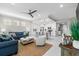 Open concept living space featuring a modern kitchen with a granite island and ample seating at 388 Aruba Cir # 103, Bradenton, FL 34209