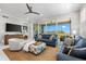 Comfortable living room with sliding glass doors leading to a screened patio offering beautiful views at 388 Aruba Cir # 103, Bradenton, FL 34209