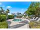 Outdoor spa with lush landscaping and gulf views at 388 Aruba Cir # 103, Bradenton, FL 34209