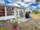 Enclosed patio, perfect for outdoor dining, with views of the well manicured landscaping at 3909 40Th W St, Bradenton, FL 34205