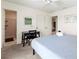Comfortable bedroom with natural light, a desk and an ensuite bathroom offers convenience and style at 3909 40Th W St, Bradenton, FL 34205