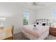 Bright bedroom with ceiling fan and scenic views from the window creates a peaceful retreat at 3909 40Th W St, Bradenton, FL 34205