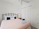 Cozy bedroom with ceiling fan, closet, and ample natural light for relaxation and comfort at 3909 40Th W St, Bradenton, FL 34205