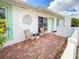 Inviting front patio with brick flooring and comfortable seating at 3909 40Th W St, Bradenton, FL 34205
