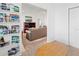 Cozy living room featuring plush seating, a media center, and a curated bookshelf display at 3909 40Th W St, Bradenton, FL 34205