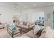Bright living room with neutral tones, comfortable seating, and an open floor plan at 3909 40Th W St, Bradenton, FL 34205