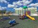Colorful playground with slide and swing set for to enjoy at 3909 40Th W St, Bradenton, FL 34205
