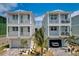 Stunning exterior showcasing modern architecture with a paver driveway and beautiful landscaping at 4206 Saltwater Pearl Way, Cortez, FL 34215