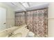 Neutral-toned bathroom with geometric shower curtain at 428 40Th W Ct, Palmetto, FL 34221