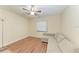 Light-filled bedroom with sleek ceiling fan and wood laminate flooring at 428 40Th W Ct, Palmetto, FL 34221