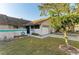 Inviting single-story home features a well-manicured lawn and an attached single-car garage at 428 40Th W Ct, Palmetto, FL 34221