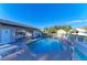 Community pool featuring lounge chairs, shade, and clear blue water at 428 40Th W Ct, Palmetto, FL 34221