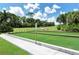 Well-maintained bocce ball court surrounded by lush greenery and manicured lawns, perfect for outdoor recreation at 4640 Tower Hill Ln # 2325, Sarasota, FL 34238
