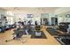 Well-equipped gym featuring cardio machines, weights, and ample workout space at 4640 Tower Hill Ln # 2325, Sarasota, FL 34238