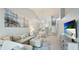 Bright living room featuring an open floor plan, vaulted ceilings, and calming beach decor at 4640 Tower Hill Ln # 2325, Sarasota, FL 34238
