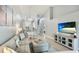 Well-lit living area showcasing the seamless layout, integrating living, dining, and kitchen spaces at 4640 Tower Hill Ln # 2325, Sarasota, FL 34238