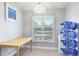 Bright office space featuring plenty of natural light, a simple desk, and storage space at 4640 Tower Hill Ln # 2325, Sarasota, FL 34238