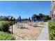 Charming patio with tables and umbrellas, providing a comfortable outdoor space with picturesque golf course views at 4640 Tower Hill Ln # 2325, Sarasota, FL 34238