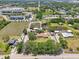 Expansive aerial view captures a home, adjacent farmland, and neighboring properties in a tranquil community setting at 5024 37Th E St, Bradenton, FL 34203