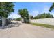 Exterior shot of dirt road and fence showing property limit at 5024 37Th E St, Bradenton, FL 34203
