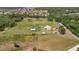 Expansive property featuring a well-maintained home, outbuildings, and fenced pasture, offering a serene rural lifestyle at 5235 Spencer Parrish Rd, Parrish, FL 34219