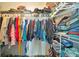 Walk-in closet with ample storage space and organization racks for clothing and shoes at 5235 Spencer Parrish Rd, Parrish, FL 34219