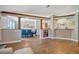 Dining room with hardwood floors, wood trim and pillars, and blue chairs at 5235 Spencer Parrish Rd, Parrish, FL 34219
