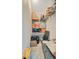 Storage room with wire rack shelving and stored boxes at 5235 Spencer Parrish Rd, Parrish, FL 34219