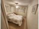 Bedroom with comfortable bedding, a ceiling fan, window with curtains, closet space, and neutral-colored carpet at 5408 Chateau Ln, Bradenton, FL 34207