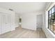 Bedroom featuring new floors, with doorway to bathroom and closet at 5414 Ansonia Ter, North Port, FL 34287