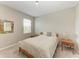 Serene bedroom with natural light and neutral tones at 5583 Summit Gln, Bradenton, FL 34203