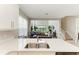 Bright kitchen features a white countertop, stainless steel sink, and eat-in dining at 5583 Summit Gln, Bradenton, FL 34203