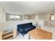 Bright loft area featuring neutral colors and a comfortable sofa at 5583 Summit Gln, Bradenton, FL 34203