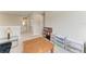 View of loft area leading into bathroom and extra storage area at 5583 Summit Gln, Bradenton, FL 34203