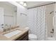 Bathroom featuring granite counter, vanity with sink, and shower-tub combination at 5711 Garden Lakes Fern, Bradenton, FL 34203