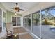 Enclosed Lanai with wicker furniture and a great view of the outdoor pool at 5711 Garden Lakes Fern, Bradenton, FL 34203