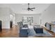 Cozy living room with a neutral color scheme, hardwood floors, and comfortable seating at 5711 Garden Lakes Fern, Bradenton, FL 34203