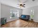 Office with modern futon, stylish laminate floors, and natural light at 5711 Garden Lakes Fern, Bradenton, FL 34203