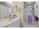 Well-lit bathroom with a marble sink vanity and glass-enclosed shower, designed for comfort and style at 6040 Oak Creek Ln # 1822, Bradenton, FL 34210