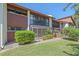 Charming exterior featuring a screened-in lanai and well-maintained landscaping, perfect for outdoor relaxation at 6040 Oak Creek Ln # 1822, Bradenton, FL 34210