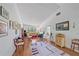 Bright and airy living room featuring wood floors, decorative art, and large window views at 6040 Oak Creek Ln # 1822, Bradenton, FL 34210