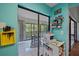 View of the sunny tiled sunroom, accessed through a sliding glass door at 6040 Oak Creek Ln # 1822, Bradenton, FL 34210