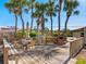 Outdoor deck and grilling area offering a relaxing space for cooking, dining, and socializing outdoors at 6204 Midnight Pass Rd # 102, Sarasota, FL 34242